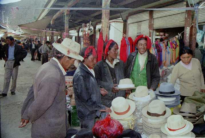 3923.jpg - Tibet (occupied by China), nomads buying hat in Shigatse. I went from Kathmandu to Lhasa by van with a group of tourists.