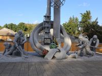 Monument to the Chernobyl Liquidators, Inscription says "To Those Who Saved the World". To the right the firefighters who died putting out the fire at the Chernobyl Nuclear Power Plant.
